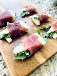 Sliced Proscuitto wrapped around Manchego Cheese and Apple Slices