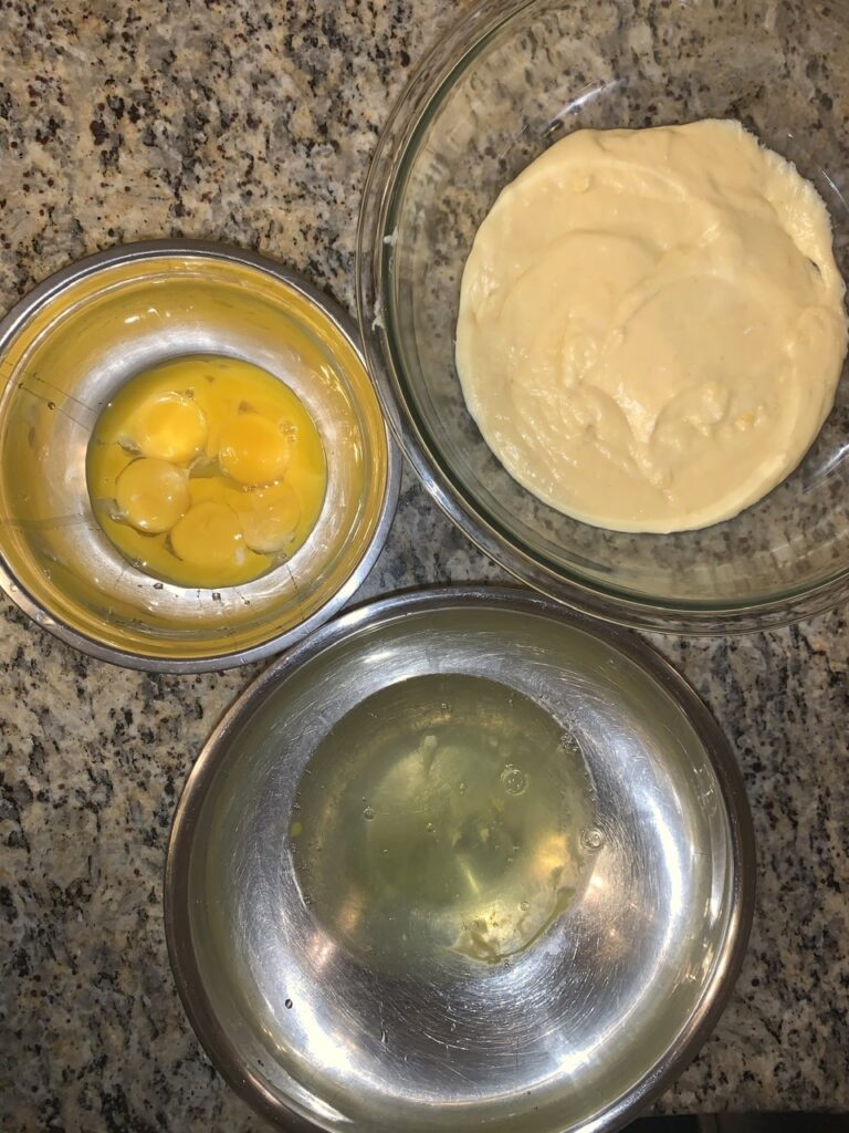 Separating the eggs for Fluffy Three-Cheese Soufflé