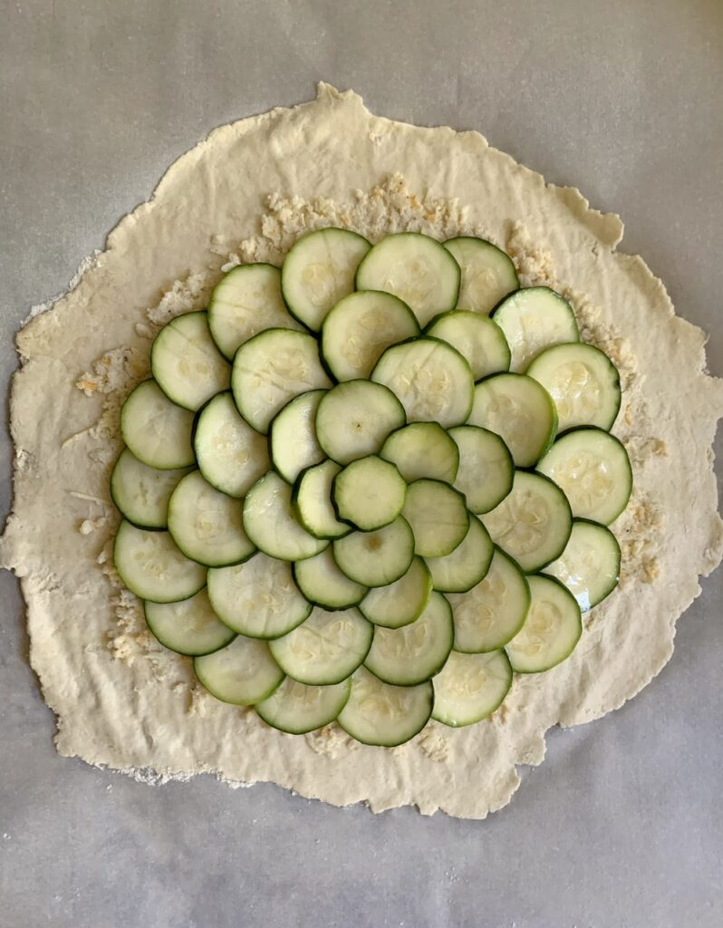 Assembling the quick zucchini and cheese galette