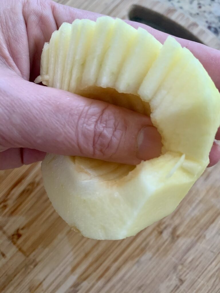 Sliced Apple half - attached on one side