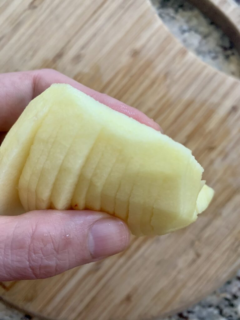 Sliced Apple half - attached on one side