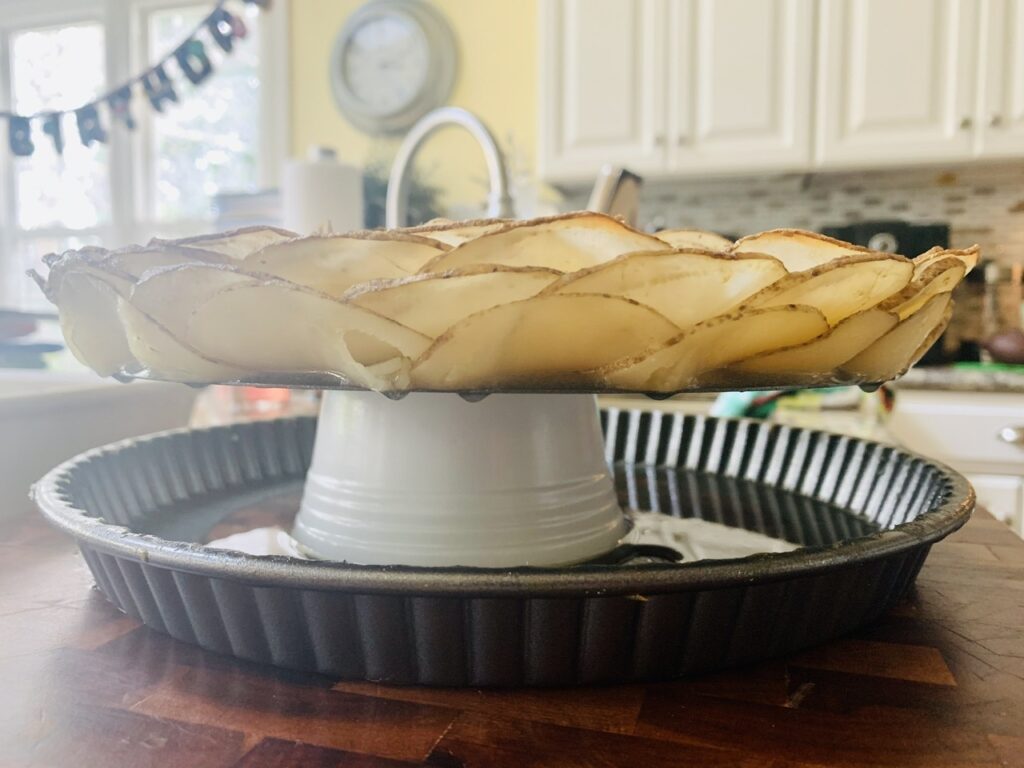 Remove from pan: Potatoes Onions Layer Pie