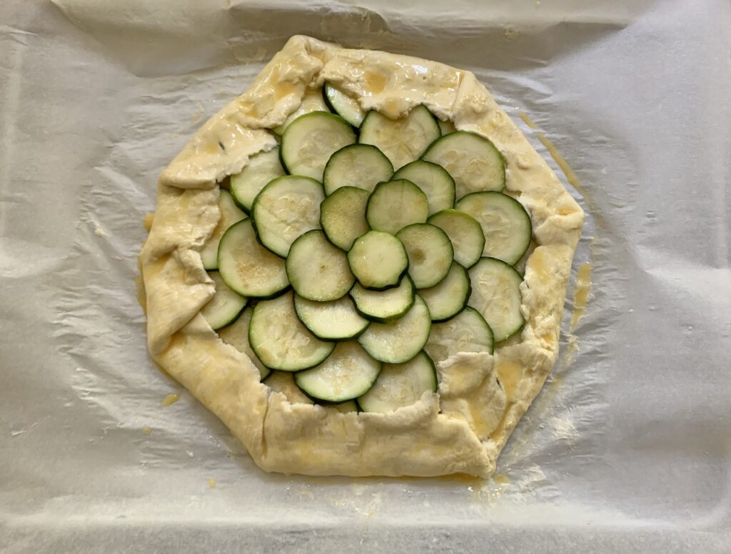 making quick zucchini and cheese galette