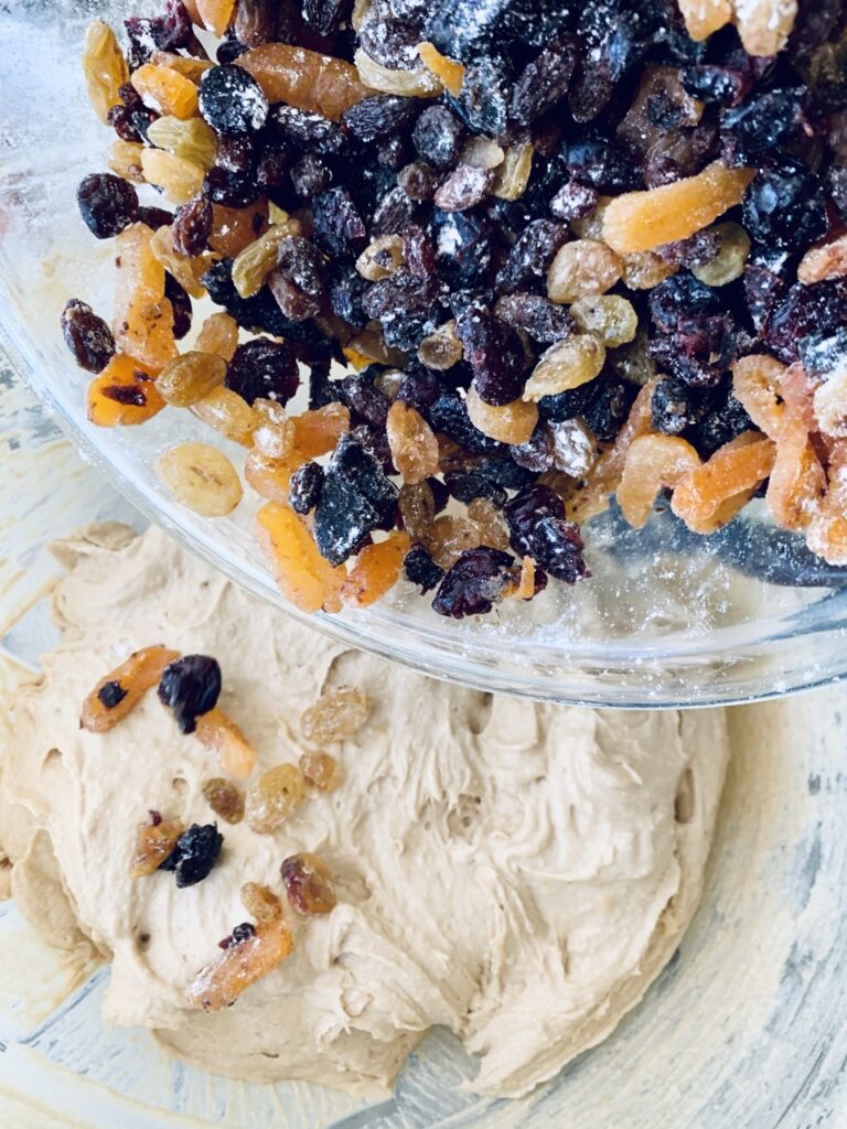 Mixing fruit into batter for Holiday Dundee Cake