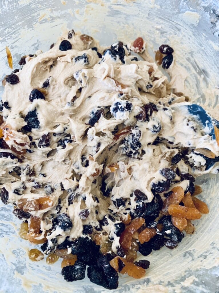 Mixing fruit into batter for Holiday Dundee Cake