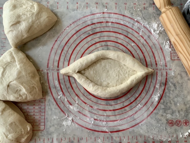 Shaping Adjaruli Khachapuri (Georgian Cheese Bread)