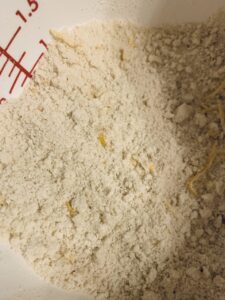 Keep blending butter into flour until it resembles coarse breadcrumbs
