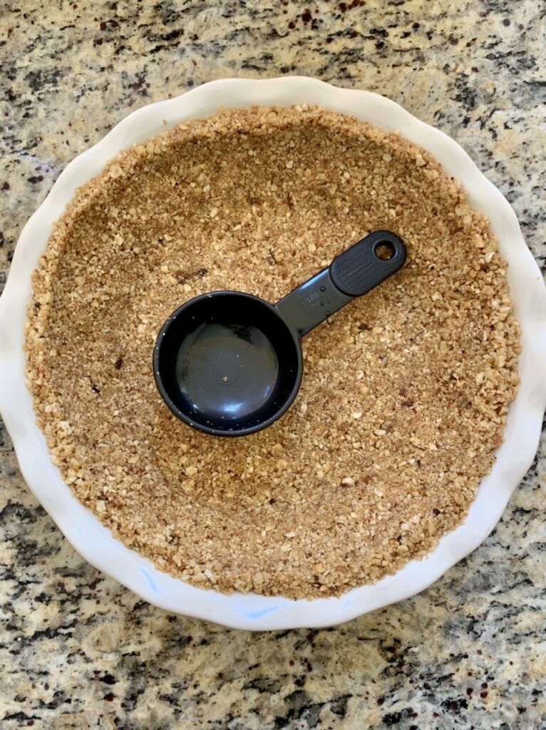 Making  nut crust for Key Lime Pie