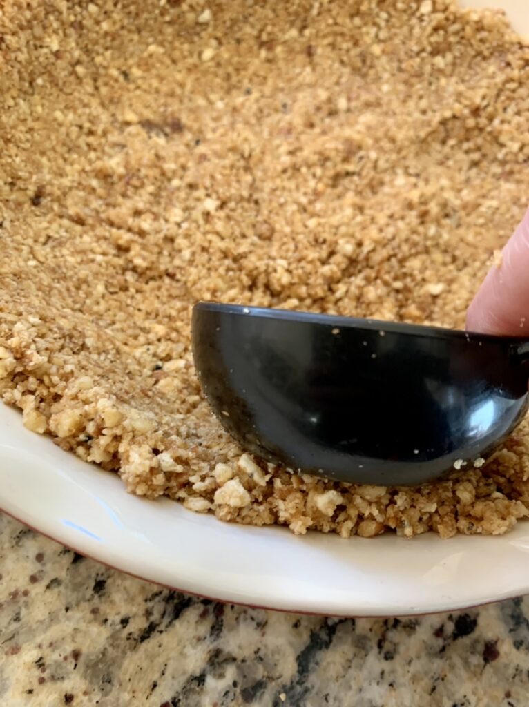 Making  nut crust for Key Lime Pie