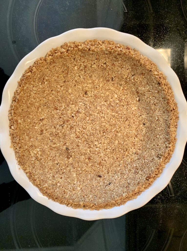 Making  nut crust for Key Lime Pie